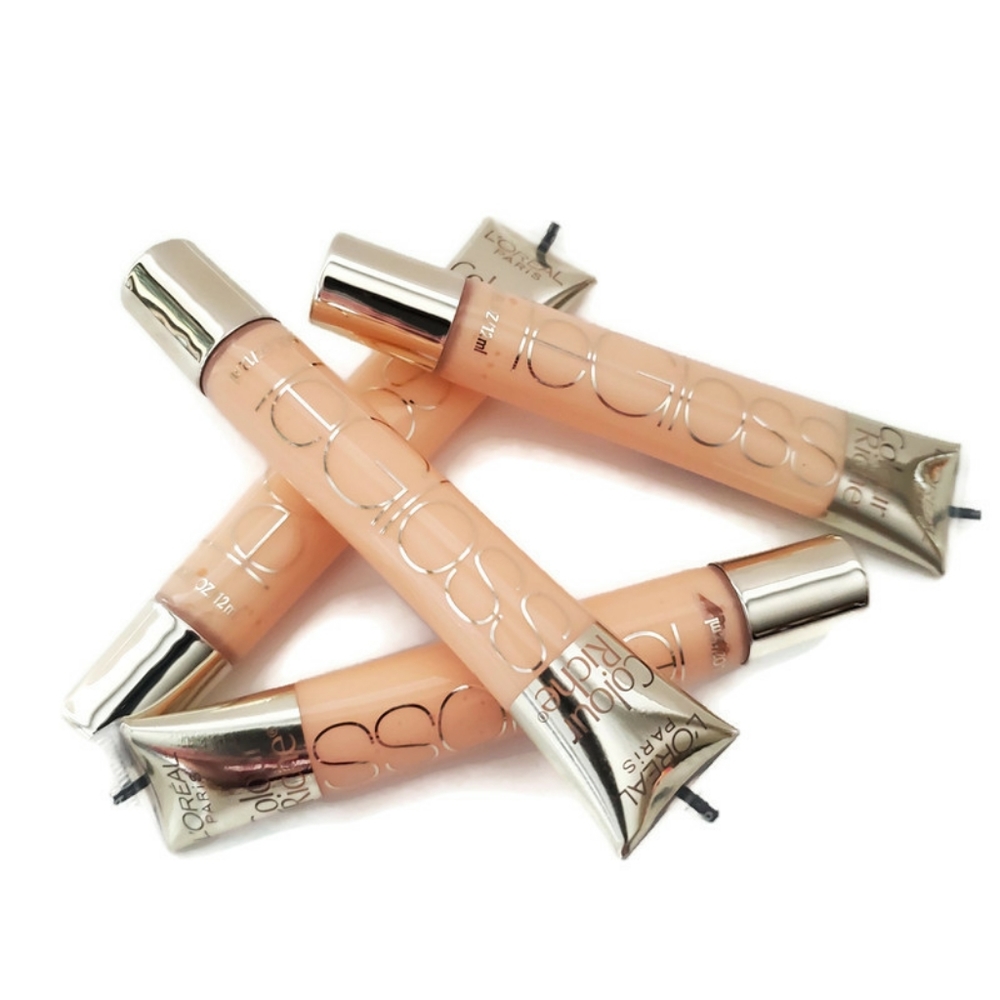 4 Tubes of Loreal Baby Blossom Lip Gloss .40oz